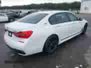 2017 BMW 7 Series 740e xDrive with VIN WBA7J2C30HG497919, listed as a IAAI auction lot 42717924 with 123,946 mi miles and . Bid and sale history available at DreamBid. Image 4.