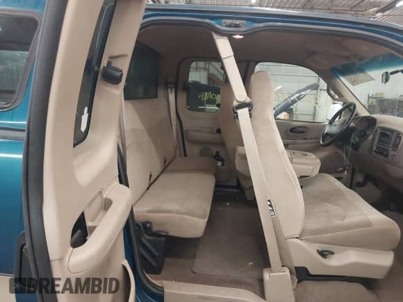 2000 Ford F-150 XL with VIN 1FTRX18L0YNA33201, listed as a IAAI auction lot 43077858 with Not provided miles and . Bid and sale history available at DreamBid. Image 8.