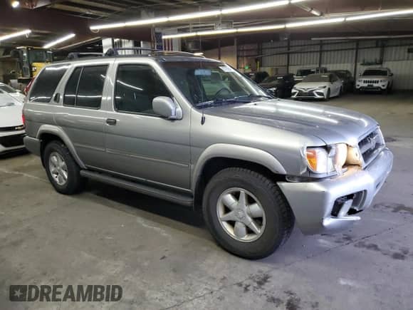 2001 Nissan Pathfinder LE с VIN JN8DR09Y11W589336, выставлен на аукционе Copart как лот 87762545 с пробегом 291 518 миль миль и Списание • Salvage title. История ставок и продаж доступна на DreamBid. Изображение 4.