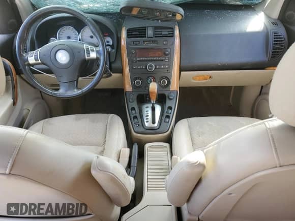 2006 Saturn VUE z VIN 5GZCZ53446S815456, wystawiony jako Copart lot #76249744 z przebiegiem 186 849 mil mil oraz Szkoda całkowita • Salvage title. Historia ofert i sprzedaży dostępna na DreamBid. Obrazek 8.