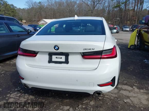 2022 BMW 3 Series 330i z VIN WBA5R1C01NFM20381, wystawiony jako IAAI lot #41579020 z przebiegiem 37 874 mil mil oraz . Historia ofert i sprzedaży dostępna na DreamBid. Obrazek 16.