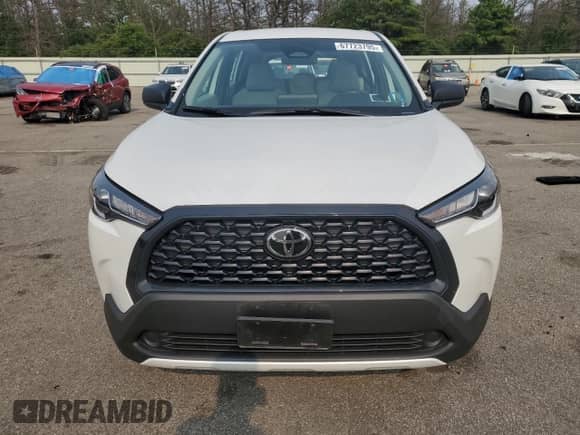 2024 Toyota Corolla Cross L with VIN 7MUAAABGXRV112077, listed as a Copart auction lot 67723795 with 13,365 mi miles and Salvage title. Bid and sale history available at DreamBid. Image 5.