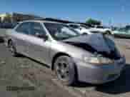 2000 Honda Accord LX с VIN 1HGCG1644YA012541, выставлен на аукционе Copart как лот 82137065 с пробегом 209 226 миль миль и Списание • Salvage title. История ставок и продаж доступна на DreamBid. Изображение 4.