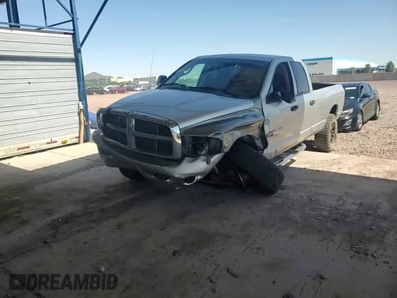 2004 Dodge 2500 SLT z VIN 3D7KU28C84G136455, wystawiony jako Copart lot #61664045 z przebiegiem 414 781 mil mil oraz Szkoda całkowita • Salvage title. Historia ofert i sprzedaży dostępna na DreamBid. Obrazek 13.