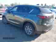 2023 Mazda CX-5 S Carbon Edition z VIN JM3KFBCM6P0143148, wystawiony jako IAAI lot #43382486 z przebiegiem 22 099 mil mil oraz . Historia ofert i sprzedaży dostępna na DreamBid. Obrazek 3.