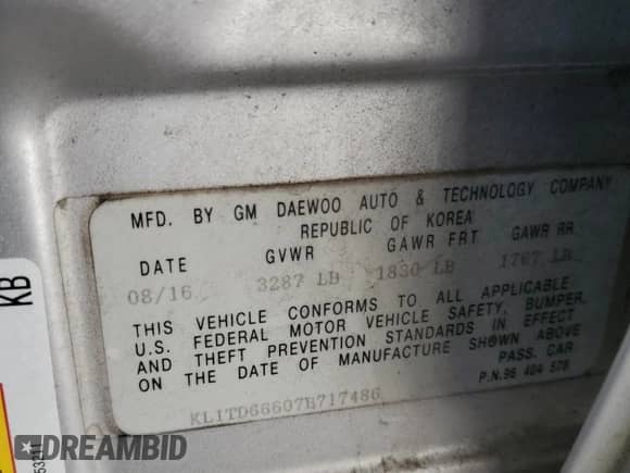 2007 Chevrolet Aveo LS z VIN KL1TD66607B717486, wystawiony jako Copart lot #81112554 z przebiegiem 96 318 mil mil oraz Szkoda całkowita • Salvage title. Historia ofert i sprzedaży dostępna na DreamBid. Obrazek 12.