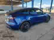 2022 Tesla Model Y Performance with VIN 7SAYGDEFXNF542785, listed as a Copart auction lot 81153785 with 53,108 mi miles and Salvage title. Bid and sale history available at DreamBid. Image 3.
