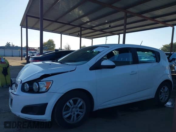 2015 Chevrolet Sonic LT with VIN 1G1JC6SH2F4121897, listed as a IAAI auction lot 43310992 with 128,444 mi miles and . Bid and sale history available at DreamBid. Image 14.