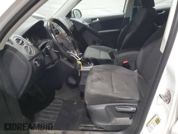 2015 Volkswagen Tiguan SEL with VIN WVGBV7AX5FW582595, listed as a Copart auction lot 68523275 with 128,991 mi miles and Salvage title. Bid and sale history available at DreamBid. Image 7.