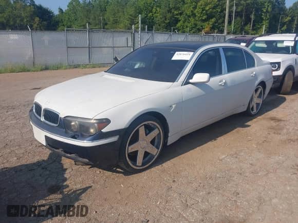 2004 BMW 7 Series 745Li with VIN WBAGN63424DS47551, listed as a IAAI auction lot 42876424 with Not provided miles and . Bid and sale history available at DreamBid. Image 2.