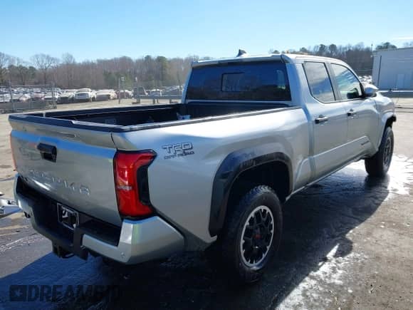 2024 Toyota Tacoma SR5 with VIN 3TMLB5JN4RM022026, listed as a IAAI auction lot 41409069 with 20,354 mi miles and . Bid and sale history available at DreamBid. Image 4.