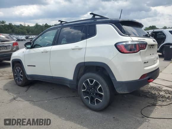 2020 Jeep Compass Trailhawk z VIN 3C4NJDDB6LT184728, wystawiony jako Copart lot #65729635 z przebiegiem Nie podano mil oraz Szkoda całkowita • Salvage title. Historia ofert i sprzedaży dostępna na DreamBid. Obrazek 2.