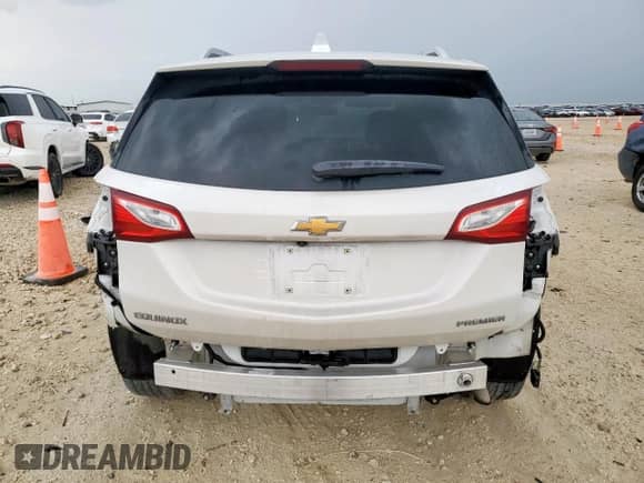 2020 Chevrolet Equinox Premier с VIN 3GNAXNEV2LS733396, выставлен на аукционе Copart как лот 69283535 с пробегом 41 486 миль миль и Списание • Salvage title. История ставок и продаж доступна на DreamBid. Изображение 6.