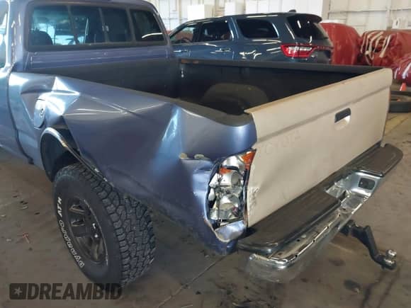 2000 Toyota Tacoma with VIN 4TAWM72N5YZ650056, listed as a IAAI auction lot 41680278 with 257,819 mi miles and . Bid and sale history available at DreamBid. Image 6.