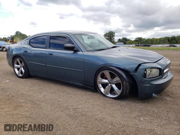 2006 Dodge Charger Fleet с VIN 2B3KA43R06H266289, выставлен на аукционе Copart как лот 67922544 с пробегом 221 291 миль миль и Списание • Salvage title. История ставок и продаж доступна на DreamBid. Изображение 4.