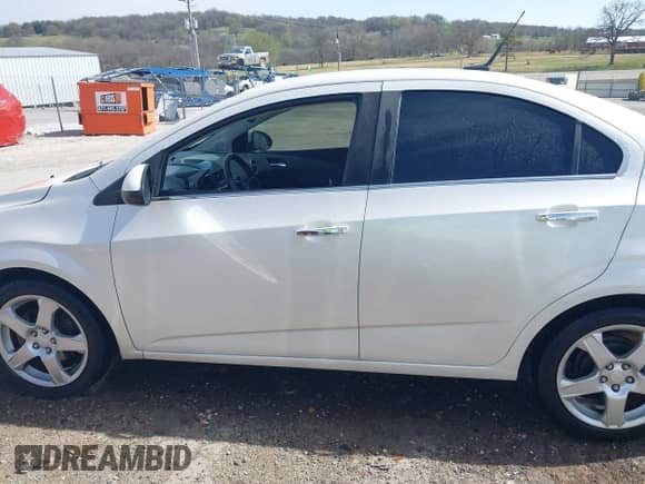 2014 Chevrolet Sonic LTZ with VIN 1G1JE5SB6E4132271, listed as a IAAI auction lot 41867508 with 115,116 mi miles and . Bid and sale history available at DreamBid. Image 14.