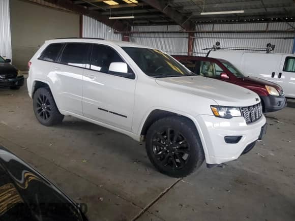 2018 Jeep Grand Cherokee Laredo E z VIN 1C4RJFAG5JC444039, wystawiony jako Copart lot #86150075 z przebiegiem 70 629 mil mil oraz Szkoda całkowita • Salvage title. Historia ofert i sprzedaży dostępna na DreamBid. Obrazek 4.