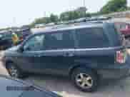 2006 Honda Pilot EX-L with VIN 2HKYF187X6H546017, listed as a IAAI auction lot 42502003 with 190,765 mi miles and . Bid and sale history available at DreamBid. Image 14.