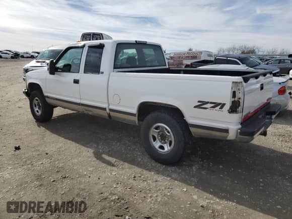 1997 GMC Sierra 1500 z VIN 1GTEK19R6VE508166, wystawiony jako Copart lot #80004994 z przebiegiem 192 120 mil mil oraz Szkoda całkowita • Salvage title. Historia ofert i sprzedaży dostępna na DreamBid. Obrazek 2.