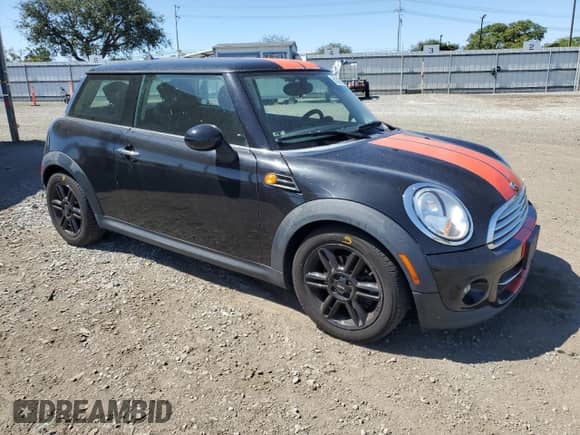 2013 MINI Hardtop with VIN WMWSU3C51DT681423, listed as a Copart auction lot 61310795 with 97,510 mi miles and Salvage title. Bid and sale history available at DreamBid. Image 4.