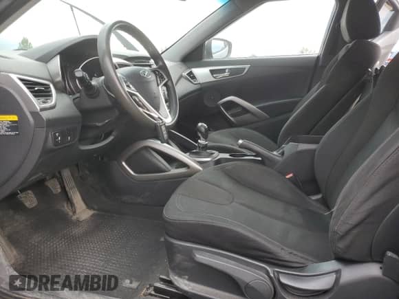 2012 Hyundai Veloster w/Red Int z VIN KMHTC6AD1CU037818, wystawiony jako Copart lot #69647765 z przebiegiem 305 408 mil mil oraz Szkoda całkowita • Salvage title. Historia ofert i sprzedaży dostępna na DreamBid. Obrazek 7.