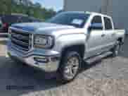 2018 GMC Sierra 1500 SLT z VIN 3GTU1NER7JG105439, wystawiony jako IAAI lot #42464862 z przebiegiem 167 209 mil mil oraz . Historia ofert i sprzedaży dostępna na DreamBid. Obrazek 2.