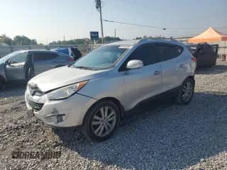 2013 Hyundai Tucson Limited с VIN KM8JU3AC6DU637729, выставлен на аукционе Copart как лот 69506985 с пробегом 156 987 миль миль и Списание • Salvage title. История ставок и продаж доступна на DreamBid. Изображение 1.