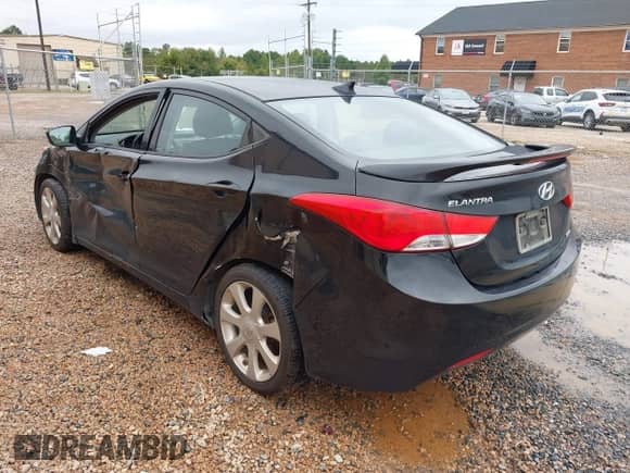 2013 Hyundai Elantra GLS with VIN KMHDH4AE7DU728890, listed as a IAAI auction lot 40365489 with 230,693 mi miles and . Bid and sale history available at DreamBid. Image 3.