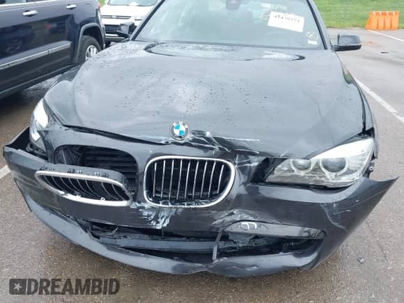 2013 BMW 7 Series 750Li with VIN WBAYE8C5XDD132883, listed as a IAAI auction lot 42470274 with 96,047 mi miles and . Bid and sale history available at DreamBid. Image 6.