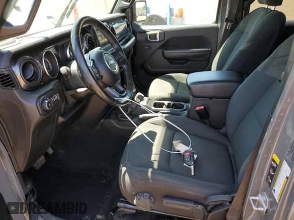 2021 Jeep Wrangler Unlimited Sport Altitude with VIN 1C4HJXDN4MW637538, listed as a Copart auction lot 62377565 with 52,998 mi miles and Salvage title. Bid and sale history available at DreamBid. Image 7.