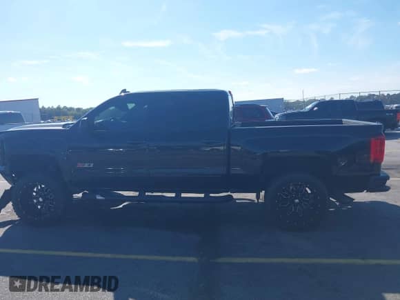 2018 Chevrolet Silverado 1500 LTZ z VIN 3GCUKSEC6JG364379, wystawiony jako IAAI lot #43445037 z przebiegiem 140 652 mil mil oraz . Historia ofert i sprzedaży dostępna na DreamBid. Obrazek 14.