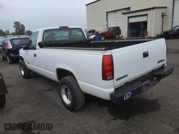 1997 GMC Sierra 1500 z VIN 1GTEK14W6VZ549578, wystawiony jako Copart lot #67808705 z przebiegiem 203 467 mil mil oraz Czysty tytuł • Clean title. Historia ofert i sprzedaży dostępna na DreamBid. Obrazek 2.