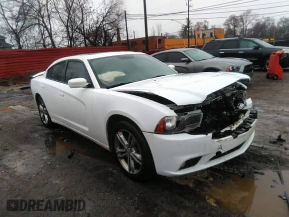 2013 Dodge Charger SXT with VIN 2C3CDXJG9DH541155, listed as a IAAI auction lot 41123246 with 118,392 mi miles and . Bid and sale history available at DreamBid. Image 1.