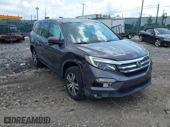 2017 Honda Pilot EX-L with VIN 5FNYF6H79HB028575, listed as a IAAI auction lot 42726028 with 76,494 mi miles and . Bid and sale history available at DreamBid. Image 1.