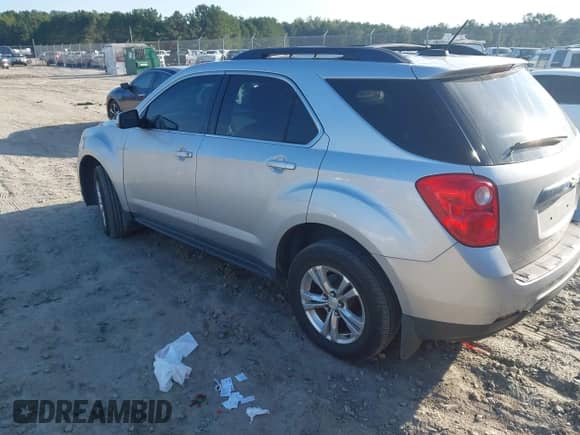 2015 Chevrolet Equinox LT z VIN 2GNALBEK0F1139423, wystawiony jako IAAI lot #43190977 z przebiegiem 143 365 mil mil oraz . Historia ofert i sprzedaży dostępna na DreamBid. Obrazek 3.