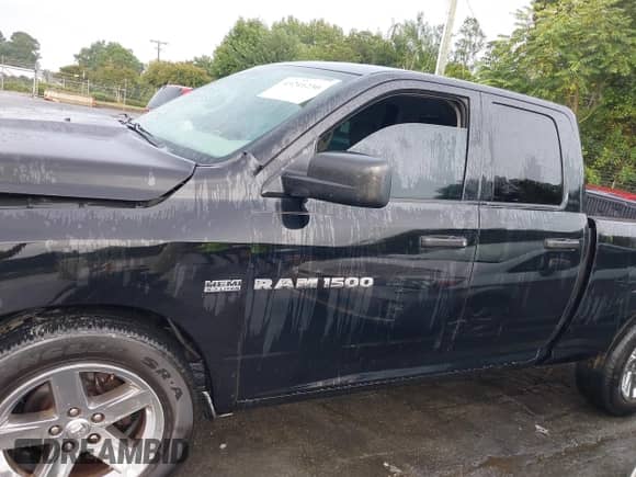 2012 Ram 1500 Tradesman with VIN 1C6RD6FT0CS156460, listed as a IAAI auction lot 43241230 with 186,040 mi miles and . Bid and sale history available at DreamBid. Image 14.