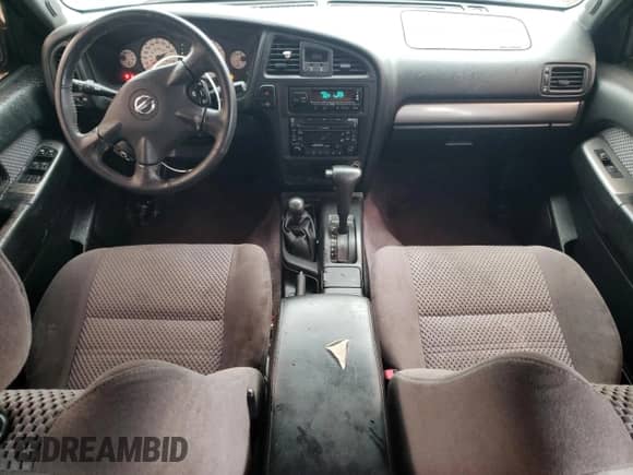 2003 Nissan Pathfinder SE z VIN JN8DR09Y83W825855, wystawiony jako Copart lot #57697885 z przebiegiem 132 050 mil mil oraz Szkoda całkowita • Salvage title. Historia ofert i sprzedaży dostępna na DreamBid. Obrazek 8.