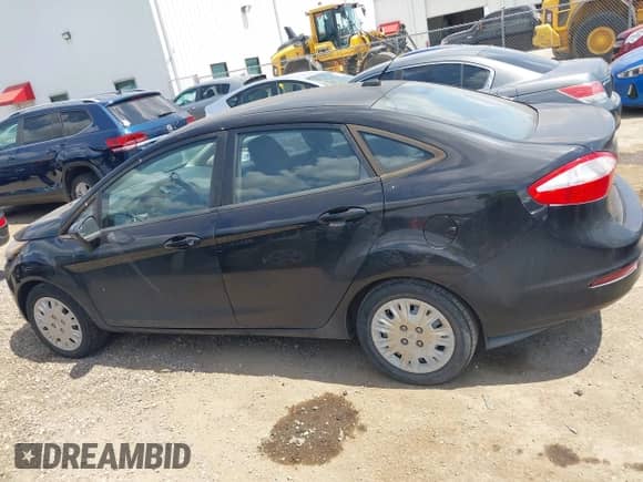 2015 Ford Fiesta S with VIN 3FADP4AJ4FM110556, listed as a IAAI auction lot 43075609 with 112,801 mi miles and . Bid and sale history available at DreamBid. Image 14.