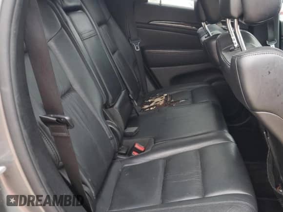 2012 Jeep Grand Cherokee Laredo z VIN 1C4RJEAG4CC261079, wystawiony jako Copart lot #69724335 z przebiegiem 156 712 mil mil oraz Szkoda całkowita • Salvage title. Historia ofert i sprzedaży dostępna na DreamBid. Obrazek 10.