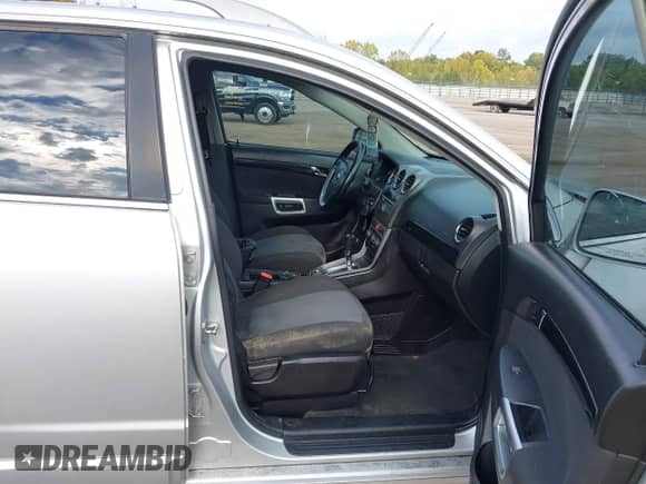 2013 Chevrolet Captiva Sport LT z VIN 3GNAL3EK5DS625250, wystawiony jako IAAI lot #43284620 z przebiegiem 123 334 mil mil oraz . Historia ofert i sprzedaży dostępna na DreamBid. Obrazek 5.