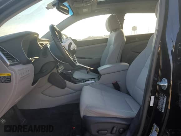 2017 Hyundai Tucson Value z VIN KM8J3CA25HU572940, wystawiony jako Copart lot #87414304 z przebiegiem 56 854 mil mil oraz Szkoda całkowita • Salvage title. Historia ofert i sprzedaży dostępna na DreamBid. Obrazek 7.