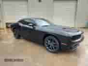 2023 Dodge Challenger SXT with VIN 2C3CDZAGXPH574116, listed as a Copart auction lot 82169465 with 54,003 mi miles and Clean title. Bid and sale history available at DreamBid. Image 4.