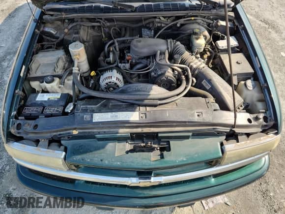 2002 Chevrolet Blazer LS with VIN 1GNDT13W42K208122, listed as a Copart auction lot 69121565 with 111,706 mi miles and Salvage title. Bid and sale history available at DreamBid. Image 12.