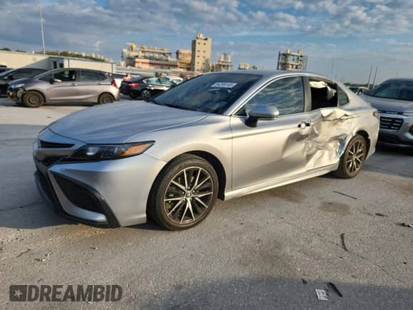 2023 Toyota Camry SE with VIN 4T1G11AK1PU807109, listed as a Copart auction lot 84289165 with 34,015 mi miles and Salvage title. Bid and sale history available at DreamBid. Image 1.