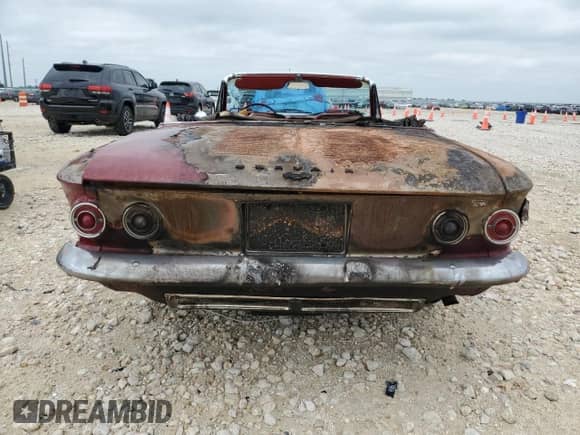 1964 Chevrolet Corvair with VIN 40967W228581, listed as a Copart auction lot 54175095 with 48,862 mi miles and Salvage title. Bid and sale history available at DreamBid. Image 6.