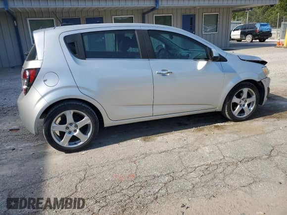2016 Chevrolet Sonic LTZ с VIN 1G1JE6SB0G4151214, выставлен на аукционе Copart как лот 80137935 с пробегом 88 660 миль миль и Списание • Salvage title. История ставок и продаж доступна на DreamBid. Изображение 3.