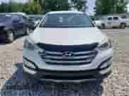 2014 Hyundai Santa Fe с VIN 5XYZU3LA2EG160691, выставлен на аукционе Copart как лот 64519545 с пробегом Не указан миль и Чистый • Clean title. История ставок и продаж доступна на DreamBid. Изображение 5.