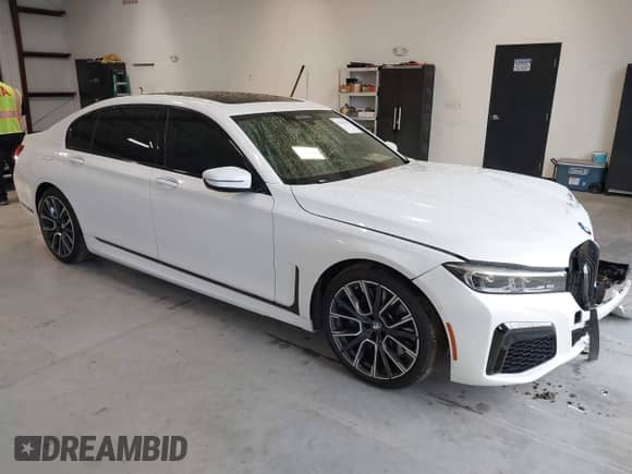 2022 BMW 7 Series 750i xDrive with VIN WBA7U2C02NCG79415, listed as a IAAI auction lot 41394743 with 31,839 mi miles and . Bid and sale history available at DreamBid. Image 1.