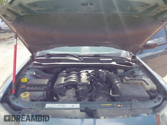 2005 Dodge Magnum SXT with VIN 2D4GZ48V15H647072, listed as a IAAI auction lot 42037095 with 187,904 mi miles and . Bid and sale history available at DreamBid. Image 10.