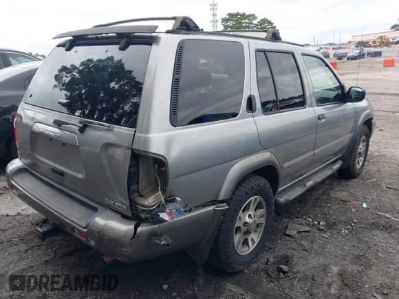 2001 Nissan Pathfinder SE z VIN JN8DR07Y61W518734, wystawiony jako IAAI lot #42935875 z przebiegiem 160 905 mil mil oraz . Historia ofert i sprzedaży dostępna na DreamBid. Obrazek 4.